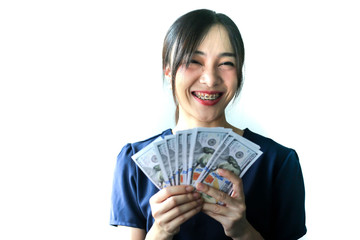 Portrait Asia smiling woman with dollars in hand,happy to have money concept.