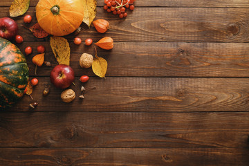 autumn background with pumpkins and leaves