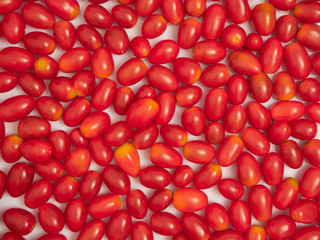Fresh cherry tomatoes on white background