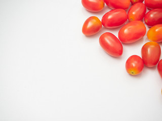Fresh cherry tomatoes on white background