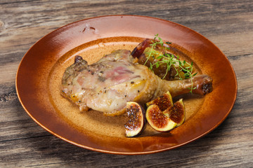 Roasted. duck. leg with plum and apple