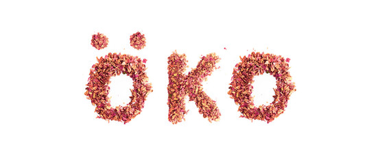 Food typography word Eco in german made of dried rose petals. Clean and healthy eating concept. Isolated on white background