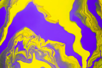 Acrylic Fluid Art. Glowing purple and yellow waves. Abstract marble background or texture