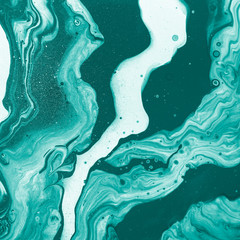 Emerald curls, waves and small inclusions. Abstract marble background or texture. Fluid Art