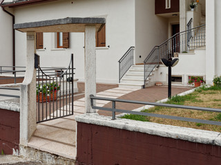 windows and doors of a building in a mountain village of Italy