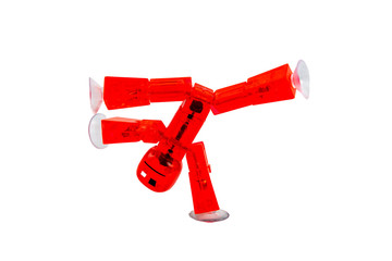 red plastic man on a white background