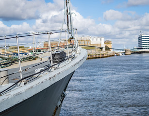 Naklejka premium Great Yarmouth, Norfolk, UK – September 08 2019. Close up of the front end of a moored ship with an out of focus background