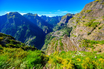 View from Eira do Serrado to Curral das Freiras village in the Nuns Valley in beautiful mountain...