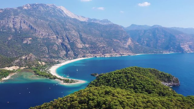 &Ouml;l&uuml;deniz is a resort village on the southwest coast of Turkey. It&rsquo;s known for the blue lagoon of &Ouml;l&uuml;deniz Tabiat Parki and the wide, white Belcekiz Beach. 