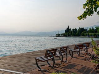 Beautiful designer benches on the promenade of Bordolino Italy