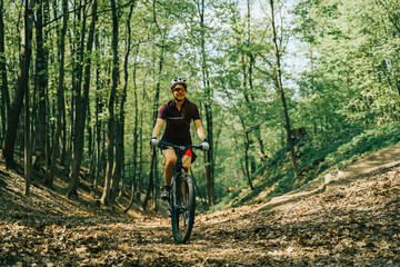 Women is riding on bicycle.