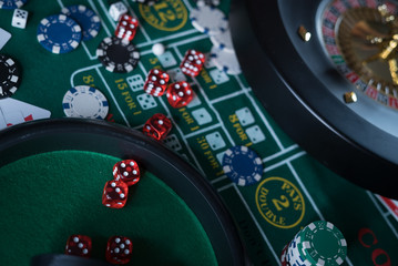 Poker Chips with roulette, gambling games concept.