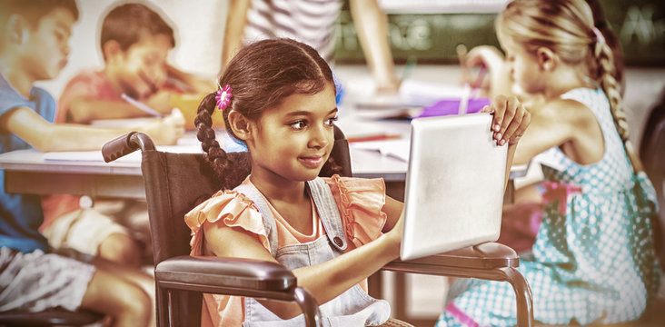 Disabled schoolgirl using digital tablet - Powered by Adobe