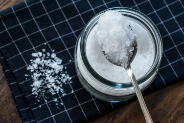 Maldon Sea Salt flakes in Jar with Spoon.