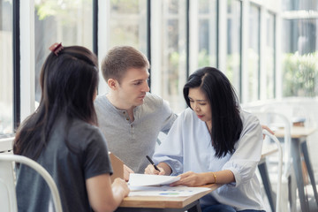 Couple meeting financial adviser for home, Woman putting signature on document loan contract, real estate purchase, success business contract deals with sale represent.