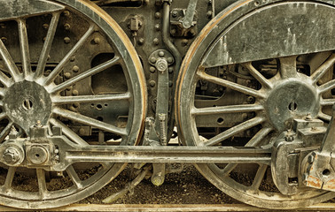 Fototapeta na wymiar Wheel details of a steam engine for technology art backgrounds