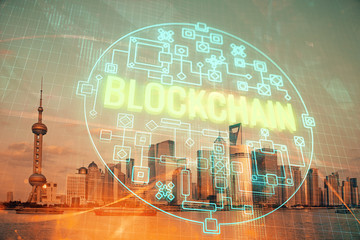 Double exposure of crypto currency theme hologram drawing and city veiw background. Concept of...