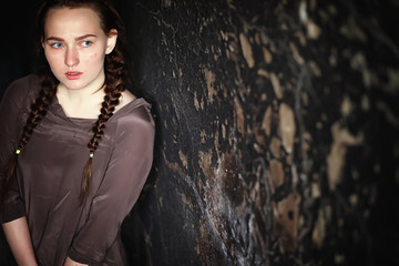 portrait of a frightened young pretty girl