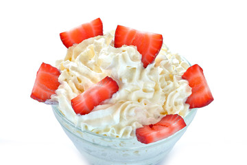 Bowl of strawberries with cream.