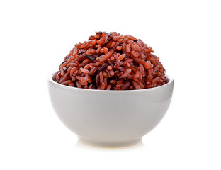 brown rice in white bowl on white background