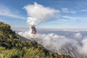Fototapeta na wymiar Volcano Santiaguito, view from Santa María, Guatemala, May 2018