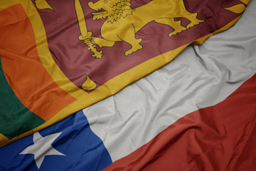 waving colorful flag of chile and national flag of sri lanka.