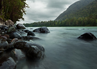  Mountain river in cloudy weather