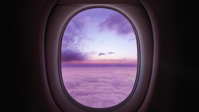 Airplane Window View, Above the Clouds, Sunset