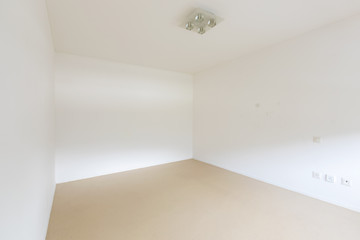 Large empty room with white walls.