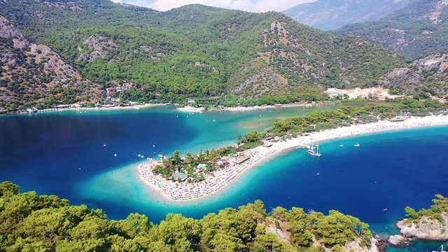 &Ouml;l&uuml;deniz is a resort village on the southwest coast of Turkey. It&rsquo;s known for the blue lagoon of &Ouml;l&uuml;deniz Tabiat Parki and the wide, white Belcekiz Beach. 