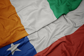 waving colorful flag of chile and national flag of cote divoire.
