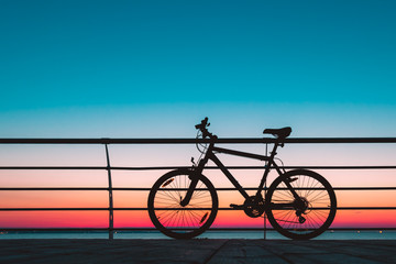 Fototapeta na wymiar bicycle silhouette on beach