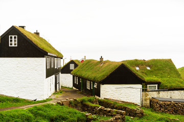 Fototapeta na wymiar Typical Faroese grass roof houses on Mykines island, Faroe.