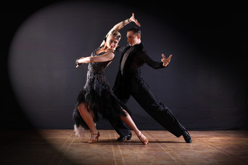 Fototapeta dancers in ballroom isolated on black background obraz
