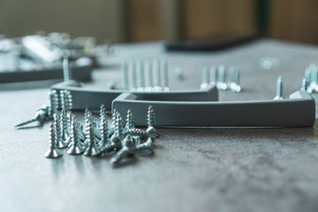Woodworking bench with screws and bolts