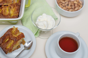 Fig cake, ice cream and a cup of tea