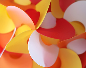 Colorful paper art mobile closeup.