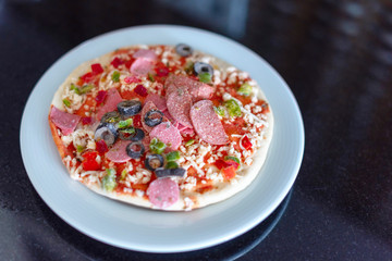 frozen pizza on a white plate