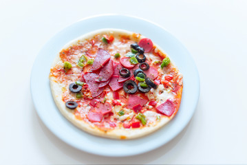 pizza with tomatoes and olives