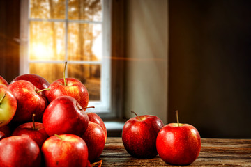 Fresh red apples and window sill background 