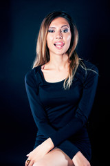 Fototapeta premium young blond real woman emotional in depression dark indoor