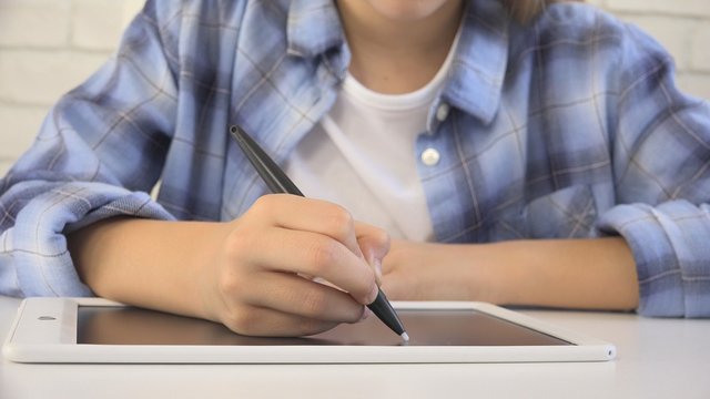 Child Studying on Tablet, Girl Writing in School Class, Learning Doing Homework