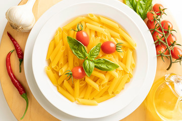 Dish with macaroni tomato and basil