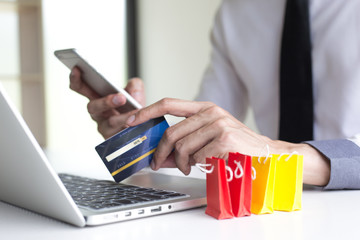 Buy products online, business people are bringing credit cards to pay for purchases. Online credit cards are easy to use.