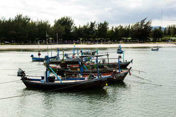 Fototapeta na wymiar Small fishing boats near the beach