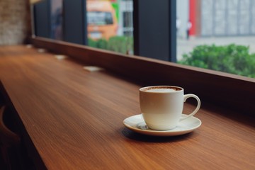 cup of coffee on table in cafe
