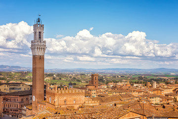 Fototapeta na wymiar Panoramic view of Siena city in Italy with Piazza del Campo and the Torre del Mangia, Tuscany region, Italy