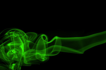 Green smoke abstract on black background