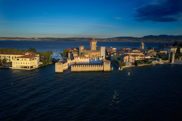 Rocca Scaligera Castle in Sirmione Lake Garda Italy. Aerial view.