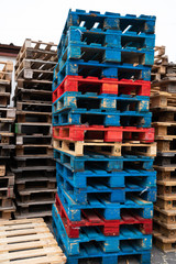 Red and blue colored wooden pallets